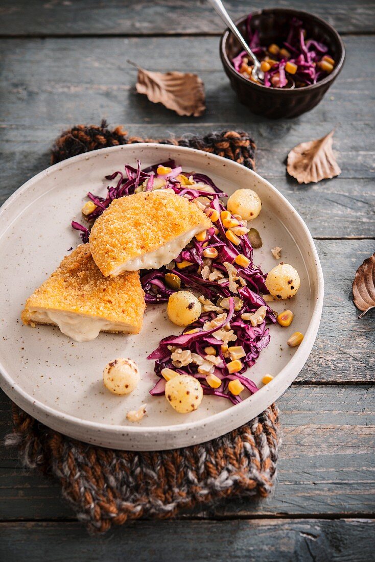 Chicken and Brie Cordon-bleu,red cabbage ,sweet corn and grelot onion salad