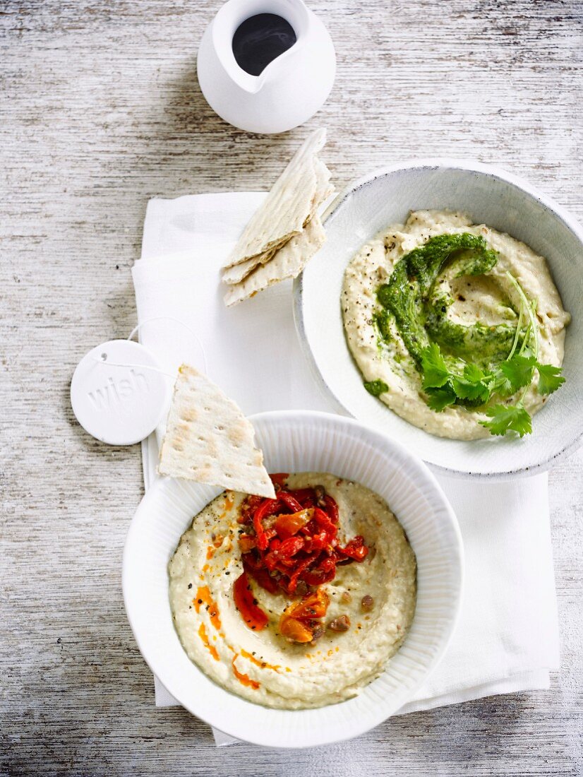 Hummus with coriander and hummus with confit peppers