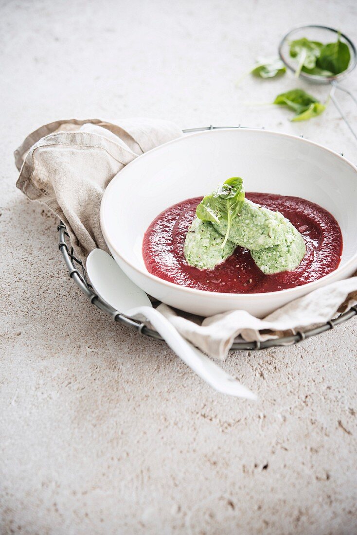Cream of beetroot soup with spinach dumplings
