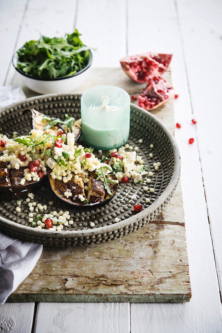 Fregola salad with pomegranate seeds and grilled aubergines