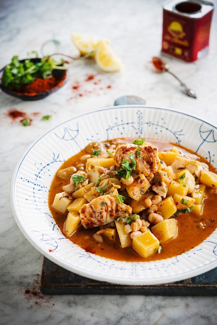 Spanish-style fish ragout with white beans and potatoes