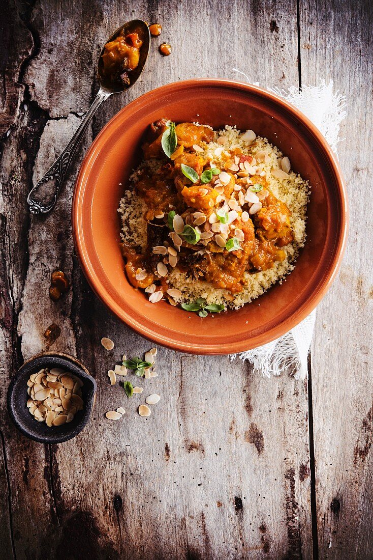 Pork,apricot and almond tajine with semolina