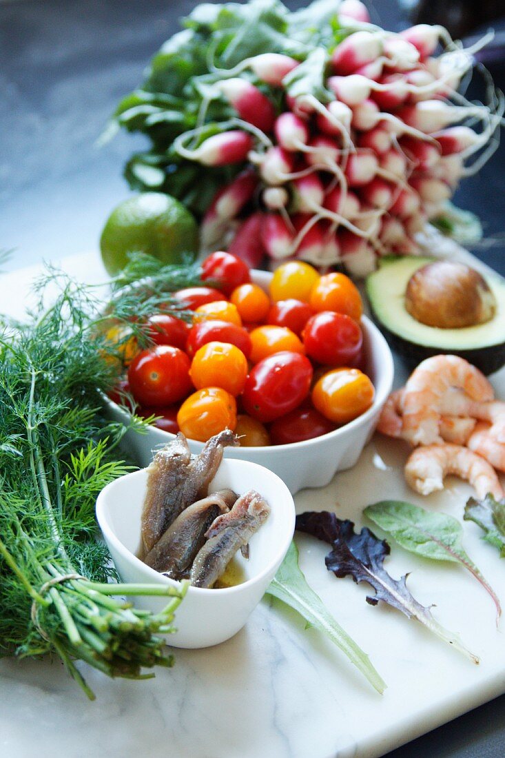 Ingredients for mixed salad with anchovies