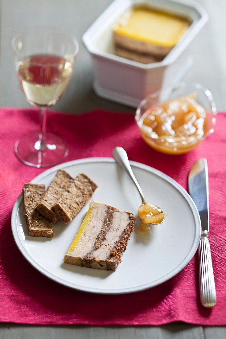 Foie gras and fig terrine,stewed pear sauce