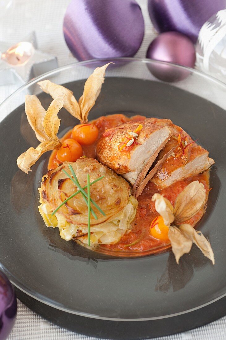 Spicy capon fillet with honey and physalis,leek and potato tian