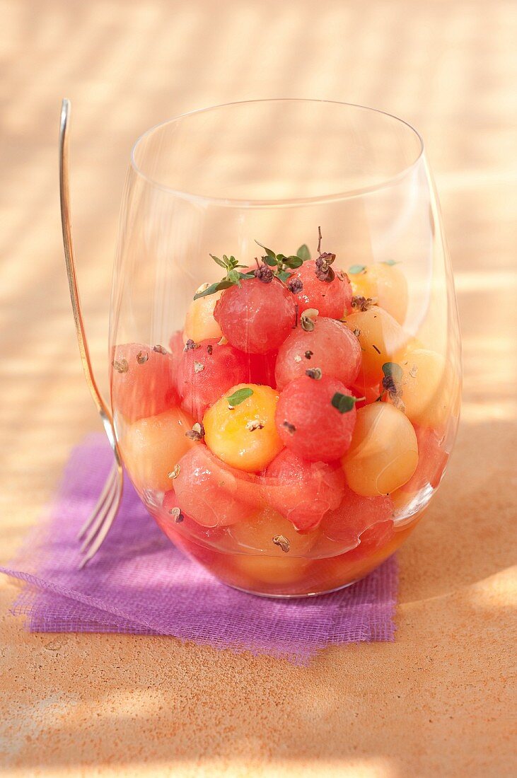 Mixed melon and watermelon ball fruit salad with thyme and Muscat de Beaumes-de-Venise