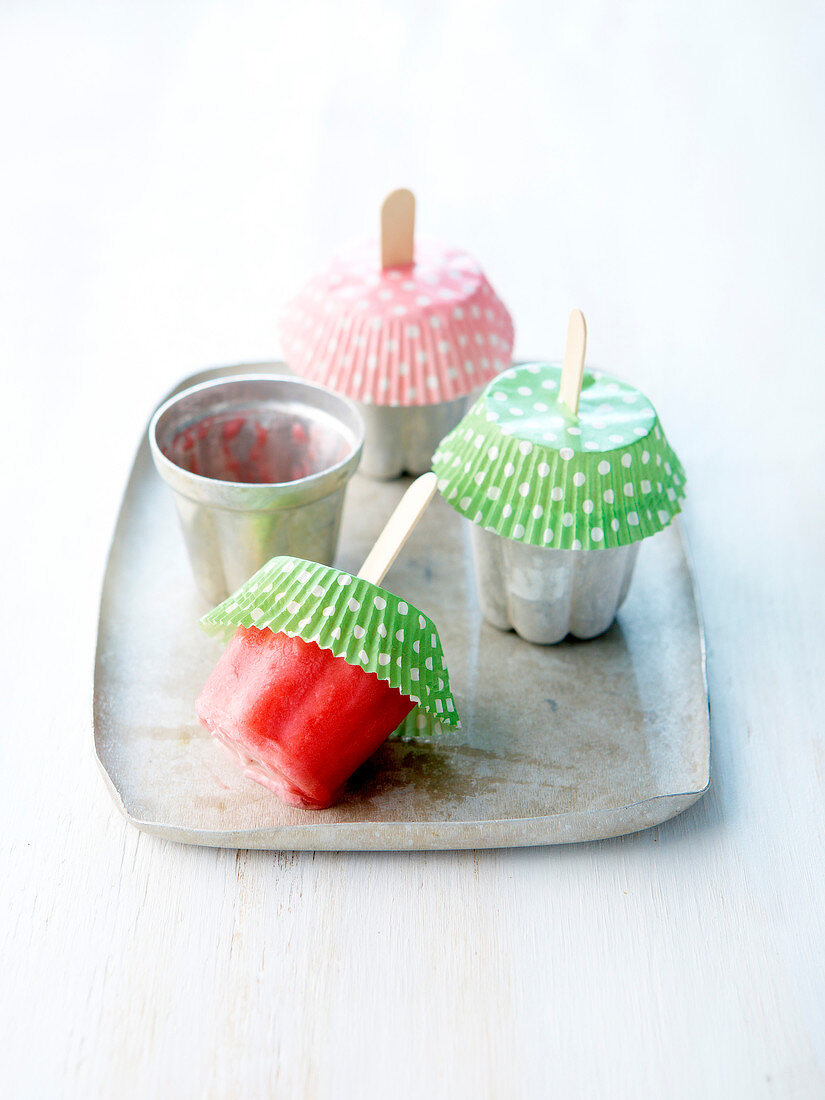 Strawberry sorbet ice lolly pops