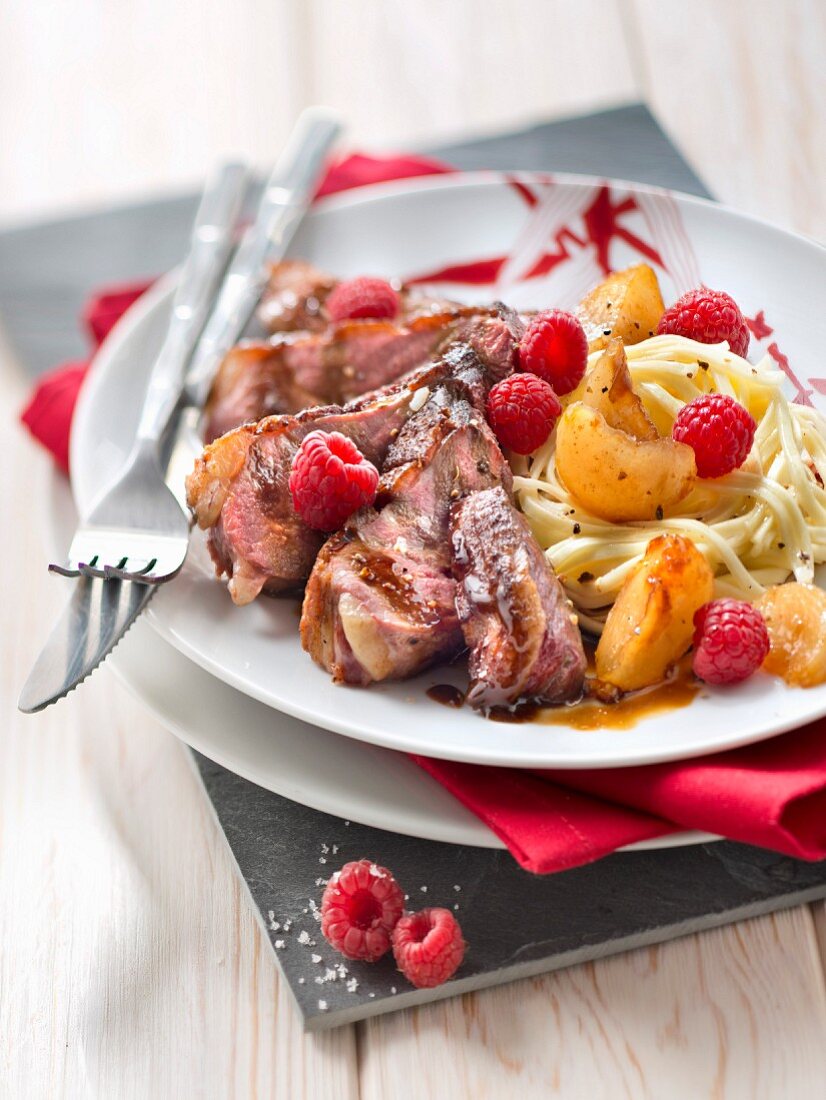 Duck breast with honey, soy sauce and raspberries, tagliatelle with turnip confit