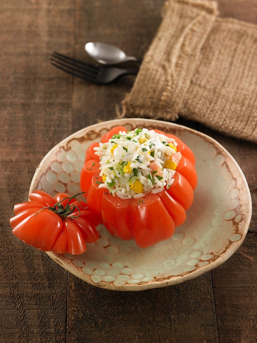 Stuffed tomato with rice and yellow pepper