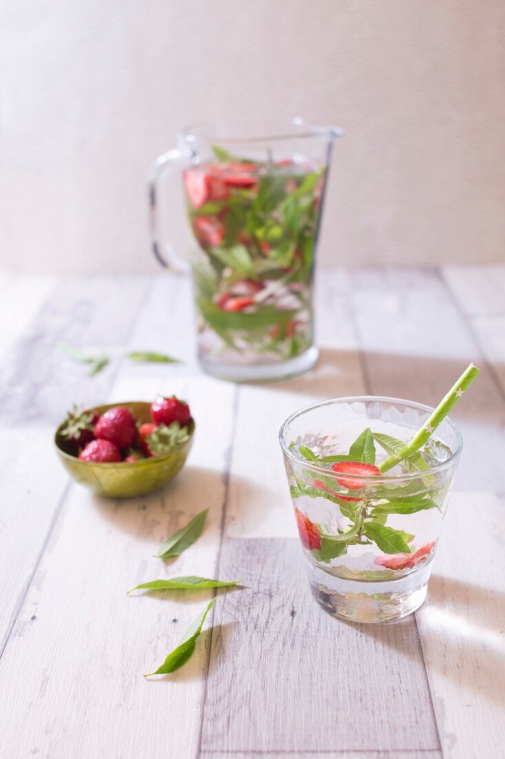 Chilled detox water with strawberries and lemon verbena