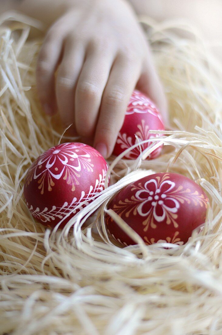 Nest of red Easter eggs