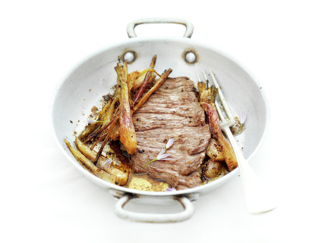 Pan-fried prime veal cut with parsnips and shallots