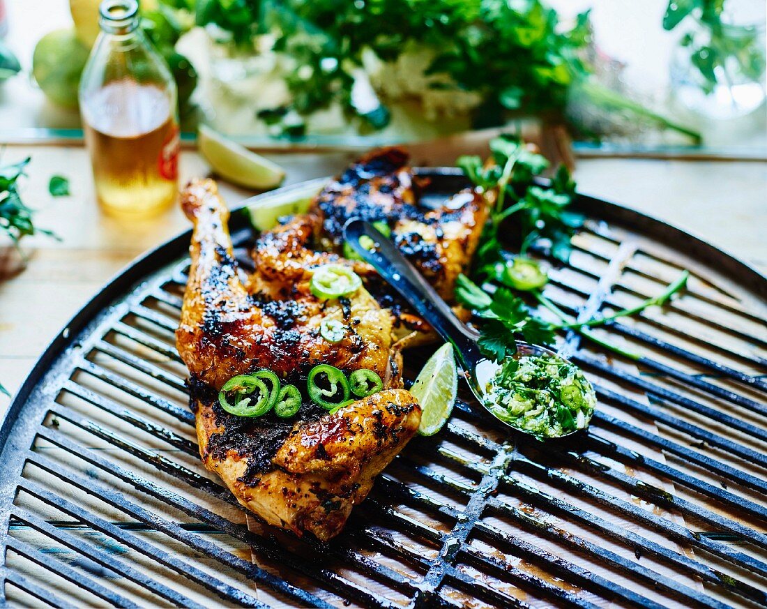 Barbecued chicken, herb and green chili pepper sauce
