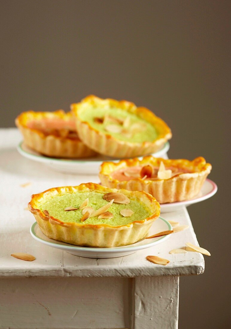 Pink and green almond tartlets