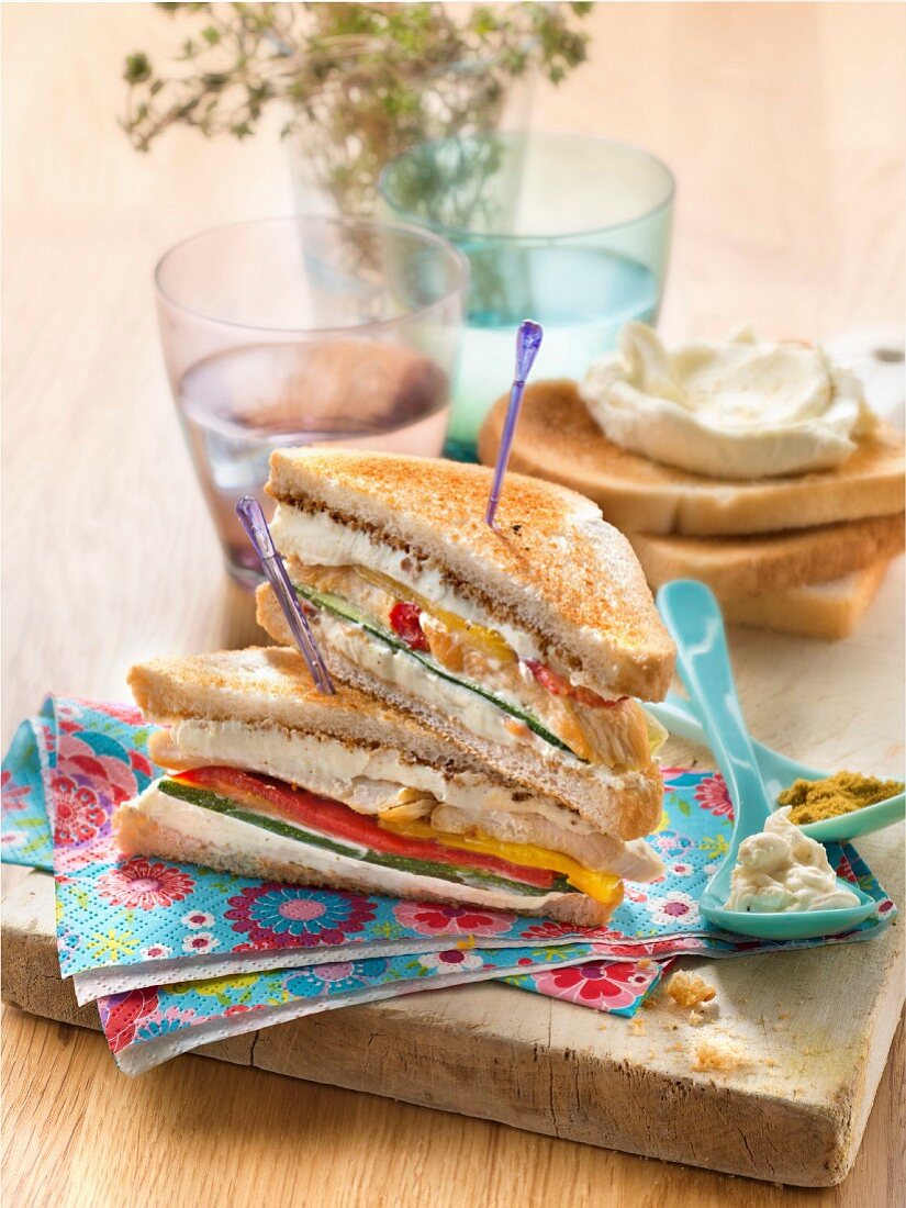Philadelphia cream cheese, curry, chicken and grilled vegetable club sandwich