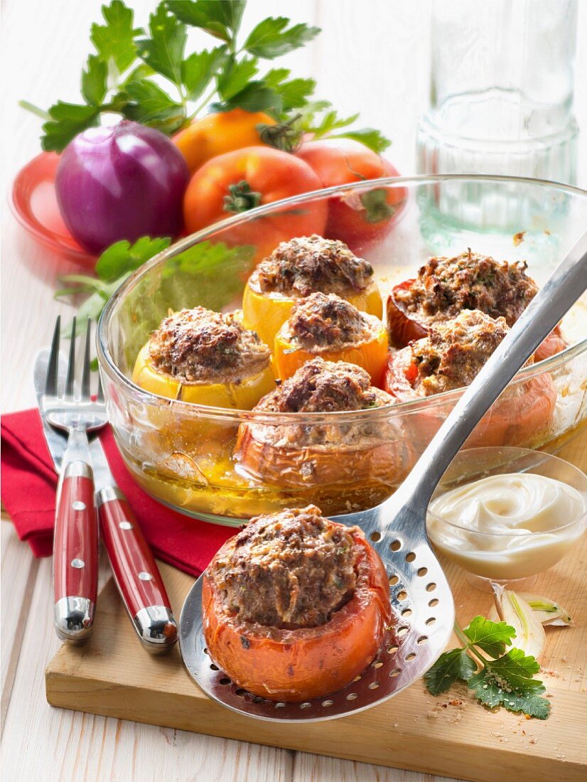 Yellow and red tomatoes stuffed with beef