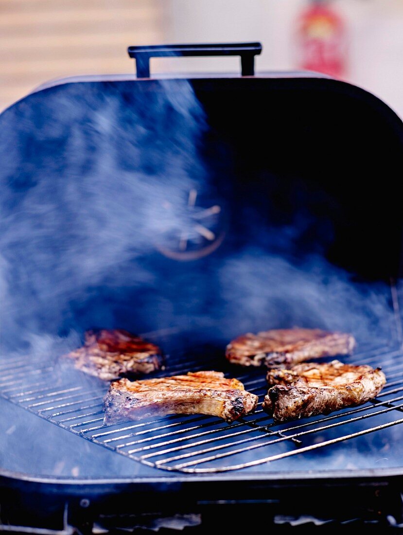 Cooking pork chops on the barbecue