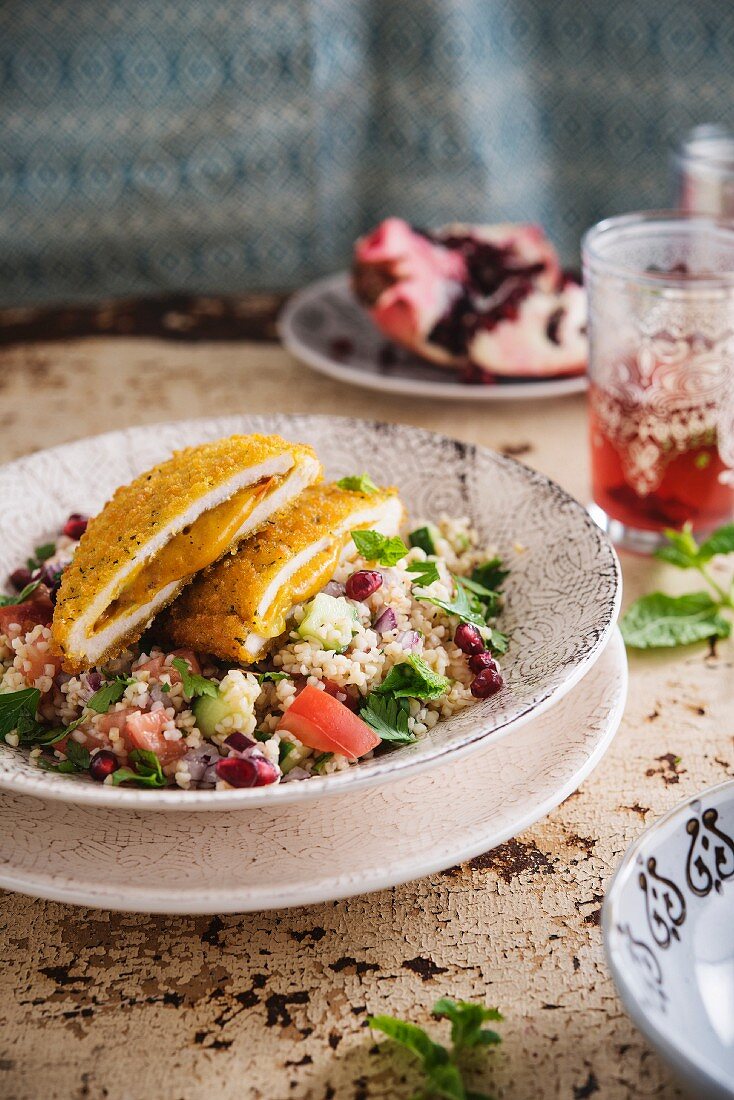 Oriental-style Cordon-bleu, bulgur tabboueh with pomegranate seeds