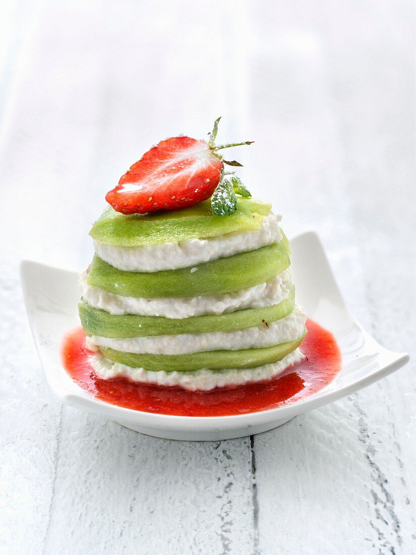 Kiwi And Fromage Blanc With Almonds Layer And Strawberry Coulis