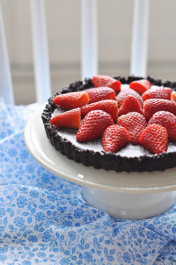 Dark Chocolate And Strawberry Pie On A China Presentation Dish