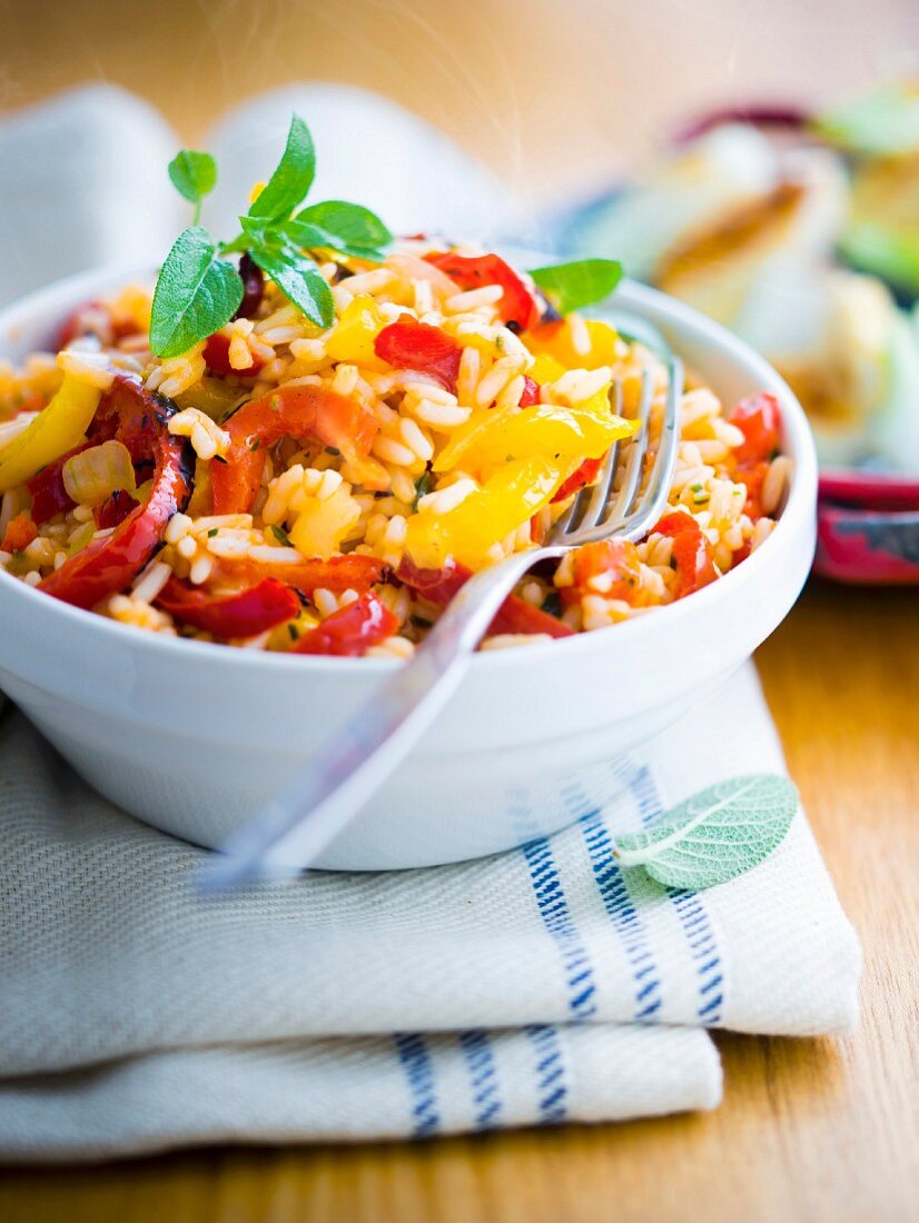 Italian-style rice with tomatoes, peppers and onions