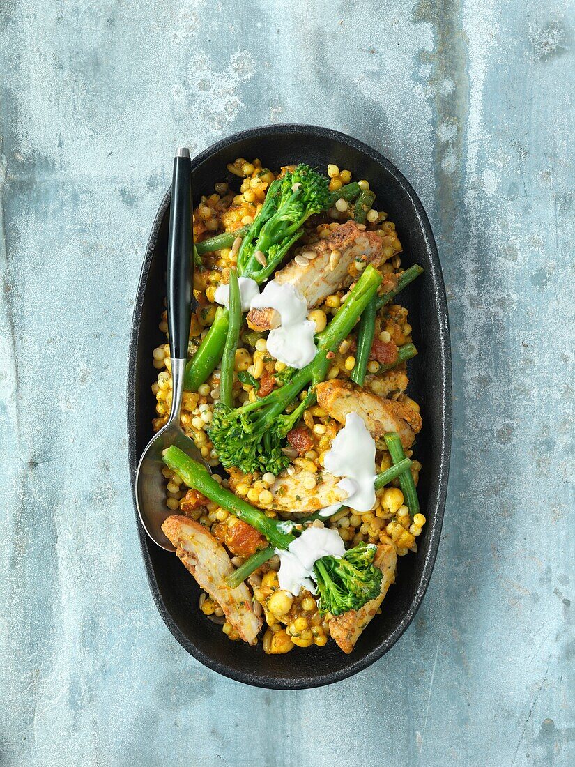 Indian lentil salad with chicken, broccoli and curry
