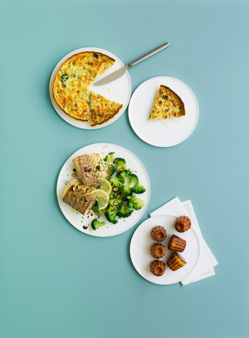 Menu with vegetable quiche, fish-broccolis and Cannelés