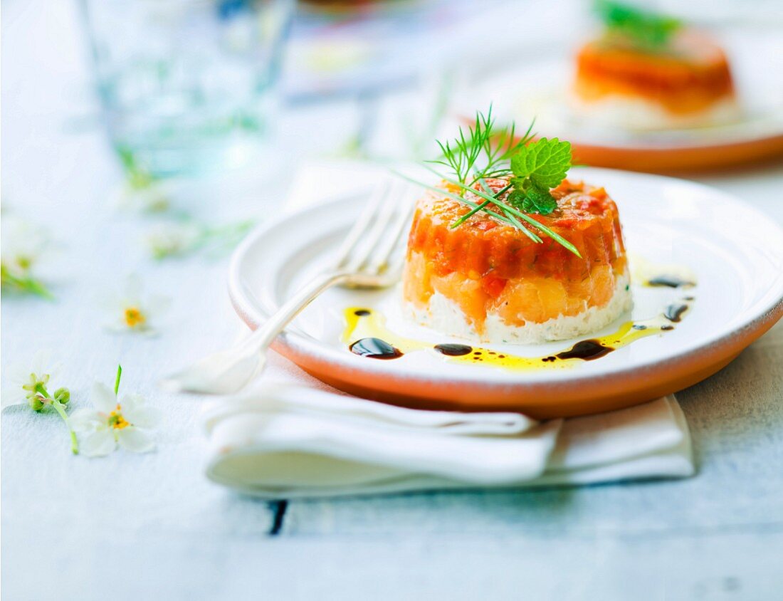 Fromage frais, salmon and stewed tomatoes with herbs