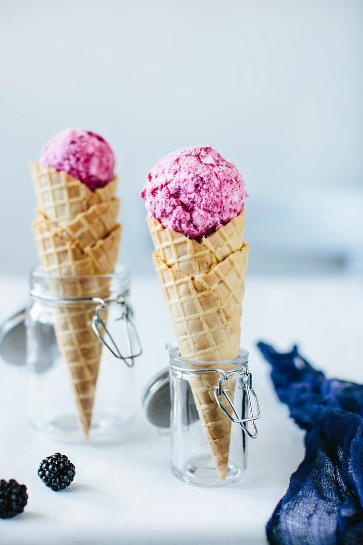 Cones of blackberry ice cream cones