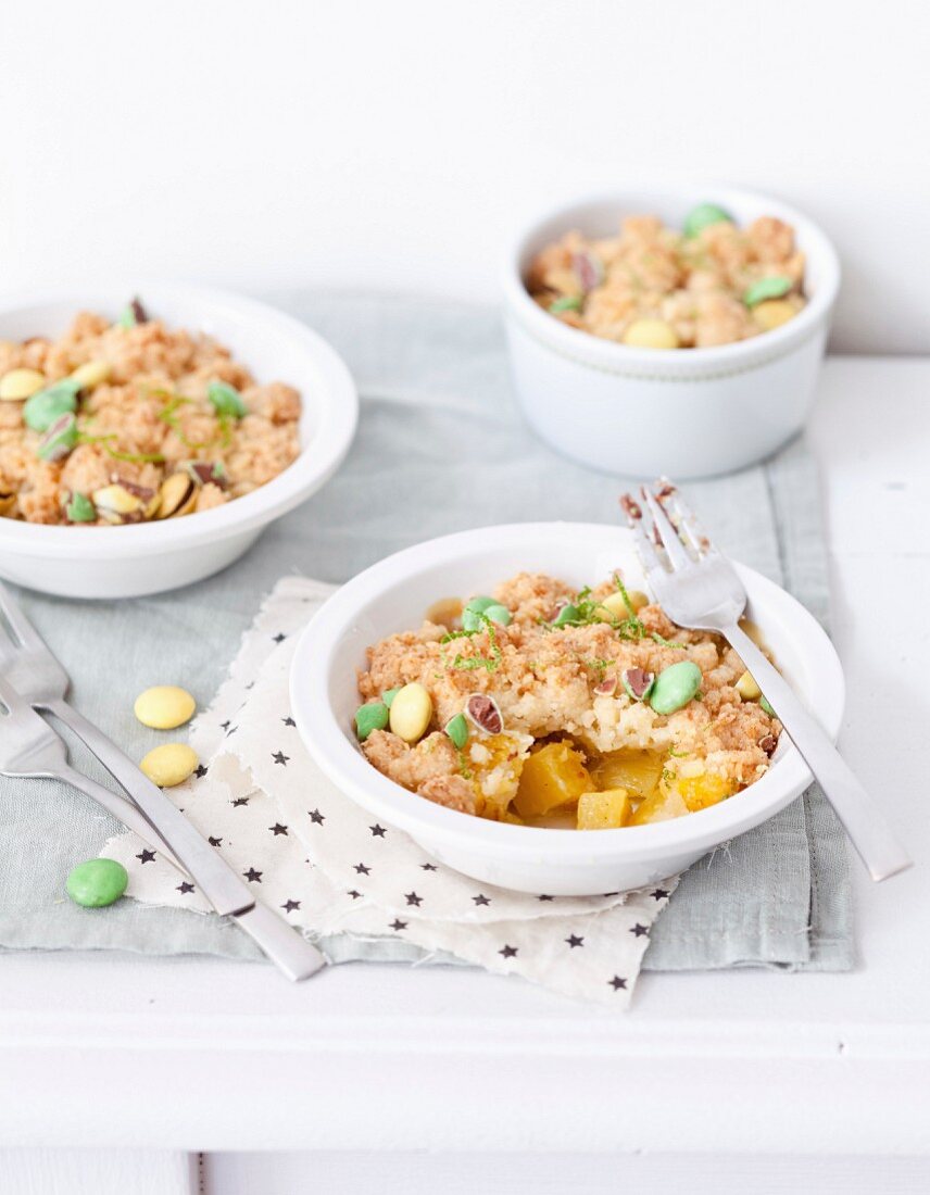 Pineapple crumble with Smarties and lime zests