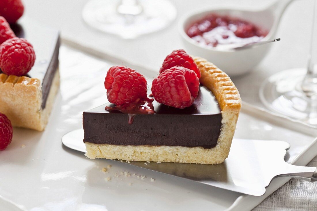 Slice of chocolate-raspberry tart