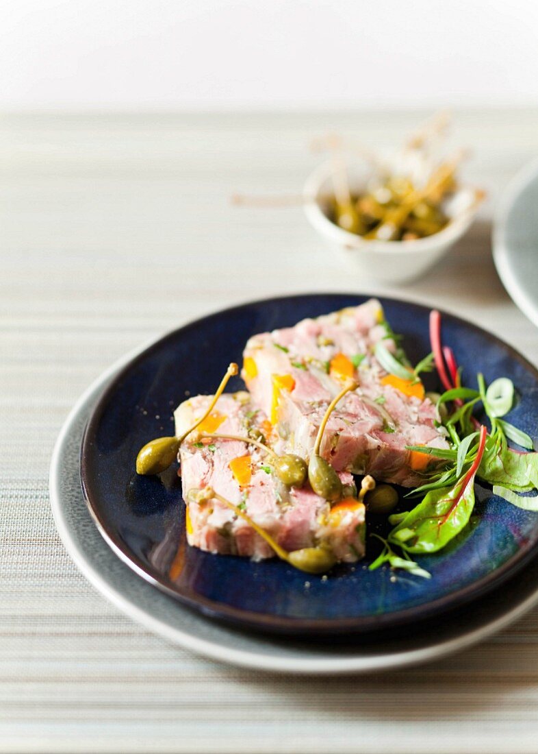 Knuckle of lamb, carrot and caper terrine