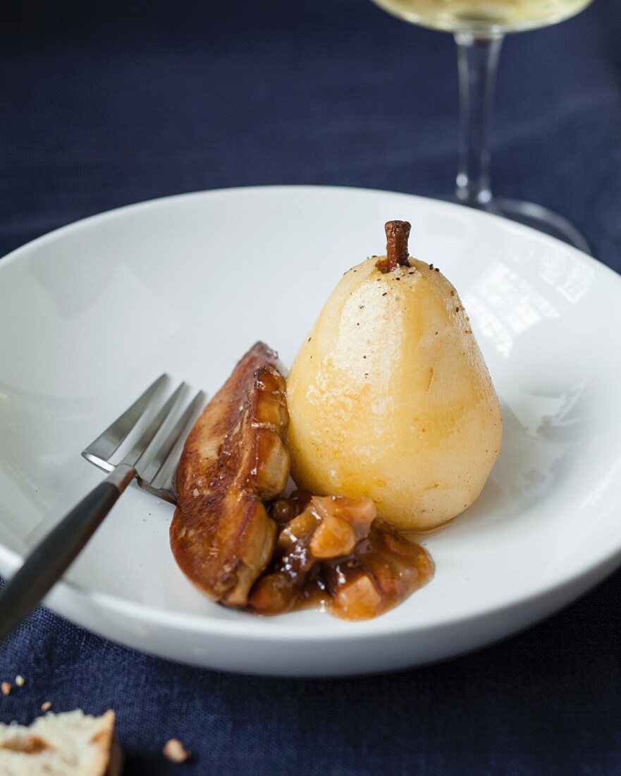 Poached pear with pan-fried foie gras and chestnut in sauce
