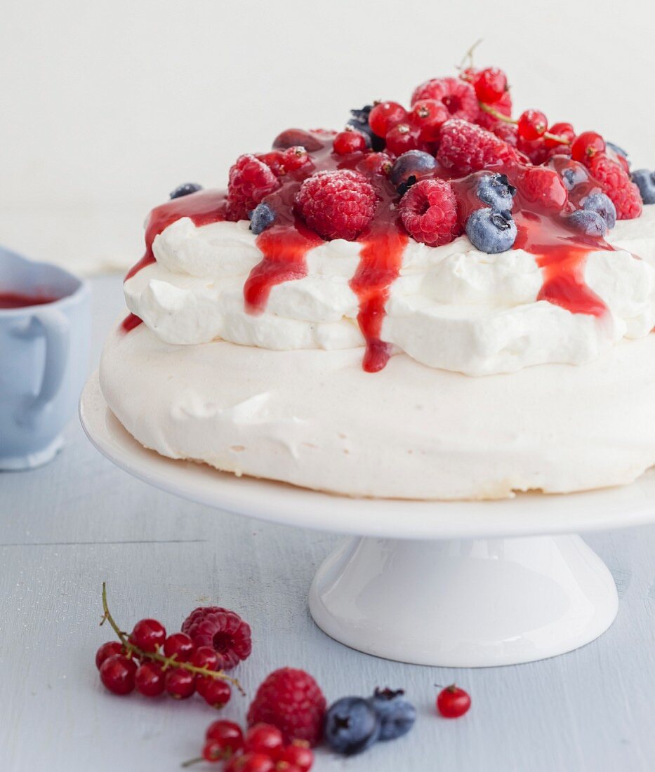 Mixed summer berry Pavlova with strawberry coulis
