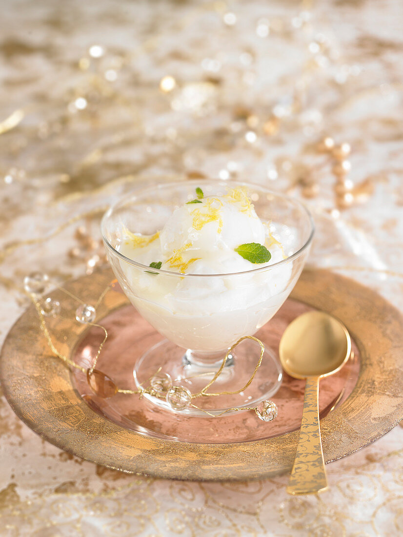 Yoghurt cream with lemon sorbet and mint flakes
