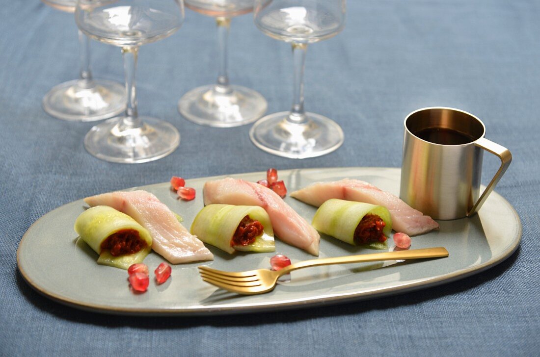 Cucumber and confit tomato rolls, raw mackerel, pomegranate seeds and vinaigrette