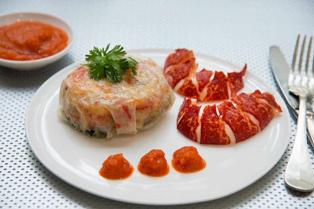 Small lobster pastilla with tomato coulis