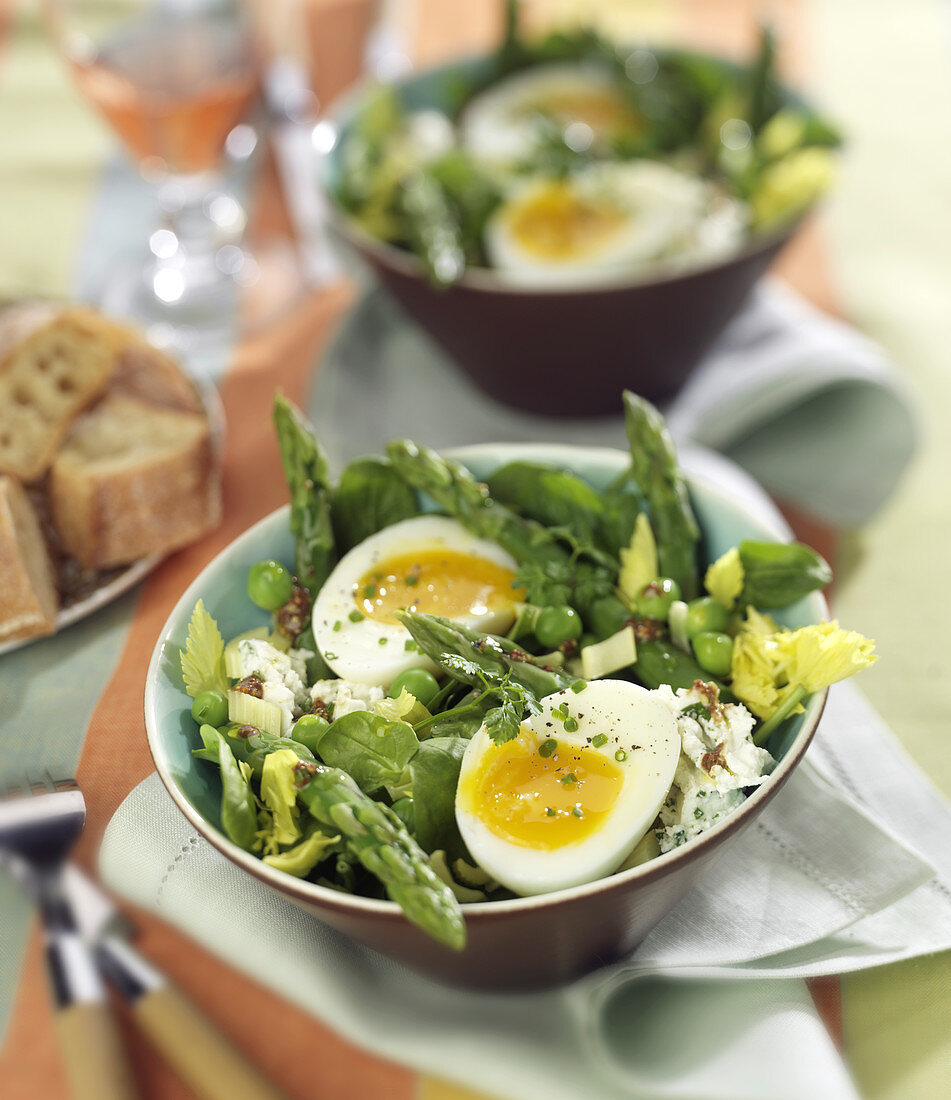Spring green salad with a soft-boiled egg