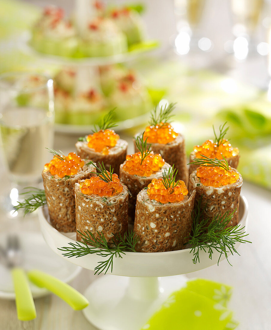Buckwheat Galette,Fresh Goat's Cheese And Fresh Herb Rolls Topped With Salmon Roe
