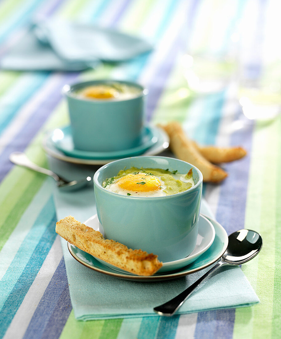 Oeuf cocotte with vegetable puree and parsley