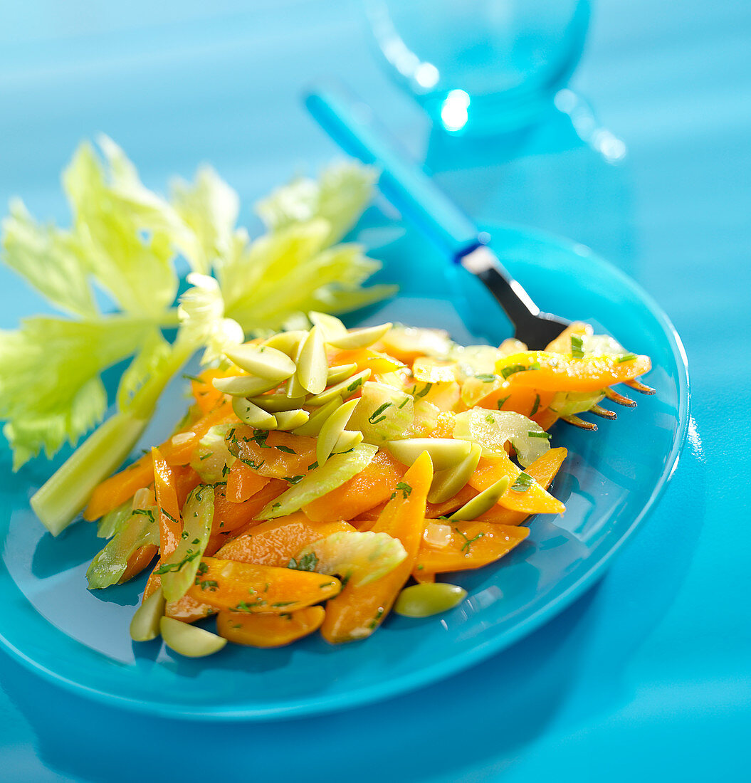 Pan-fried celery sticks,carrots and green olives