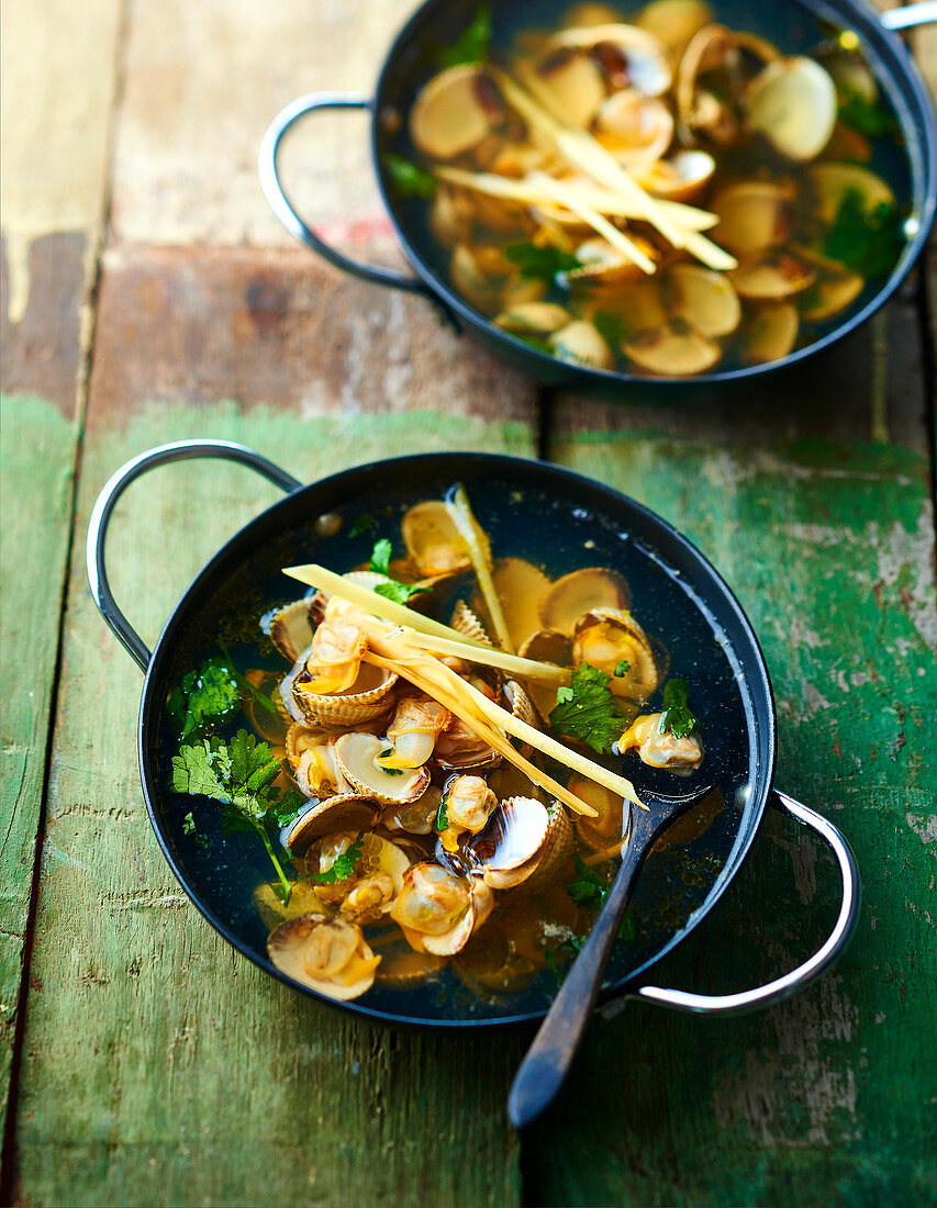 Cockle and citronella clear consommé