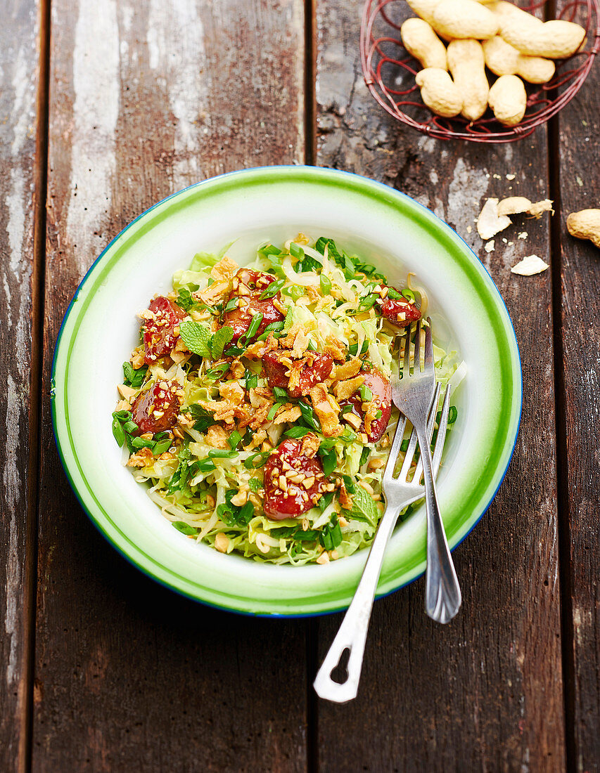 Chinese cabbage, beansprout, mint and pork marinated in maple syrup and soya sauce salad