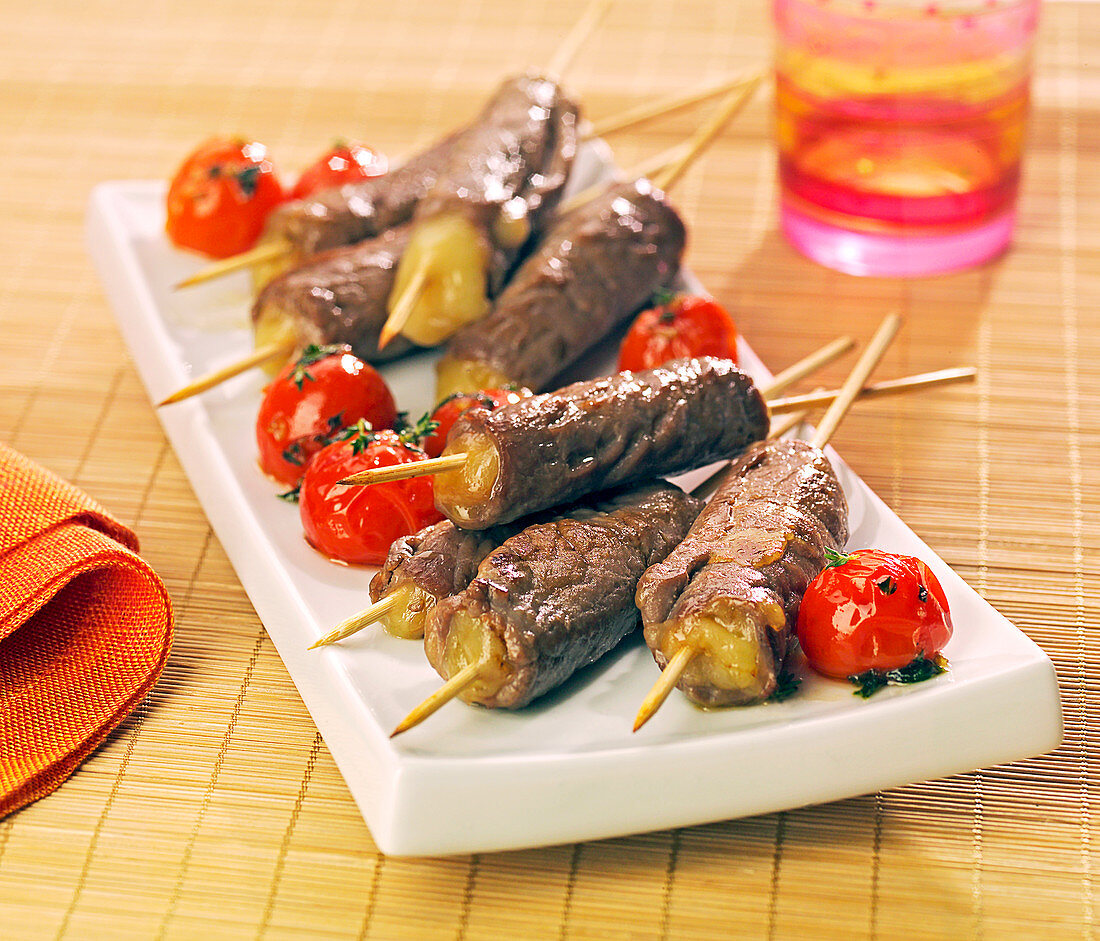 Beef and Comté brochettes with pan-fried cherry tomatoes