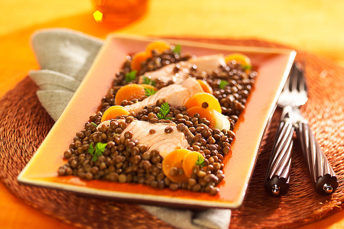 Poached salmon filets with lentils