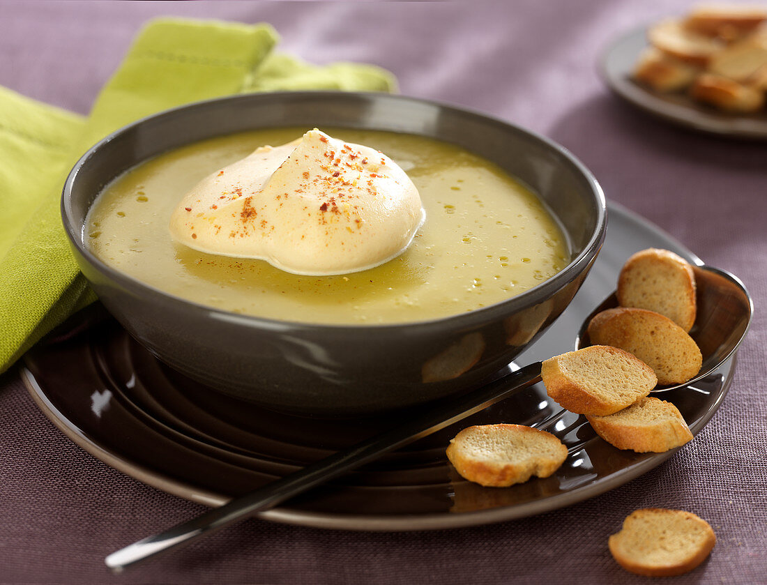 Cream of split pea soup with spicy hot whipped cream