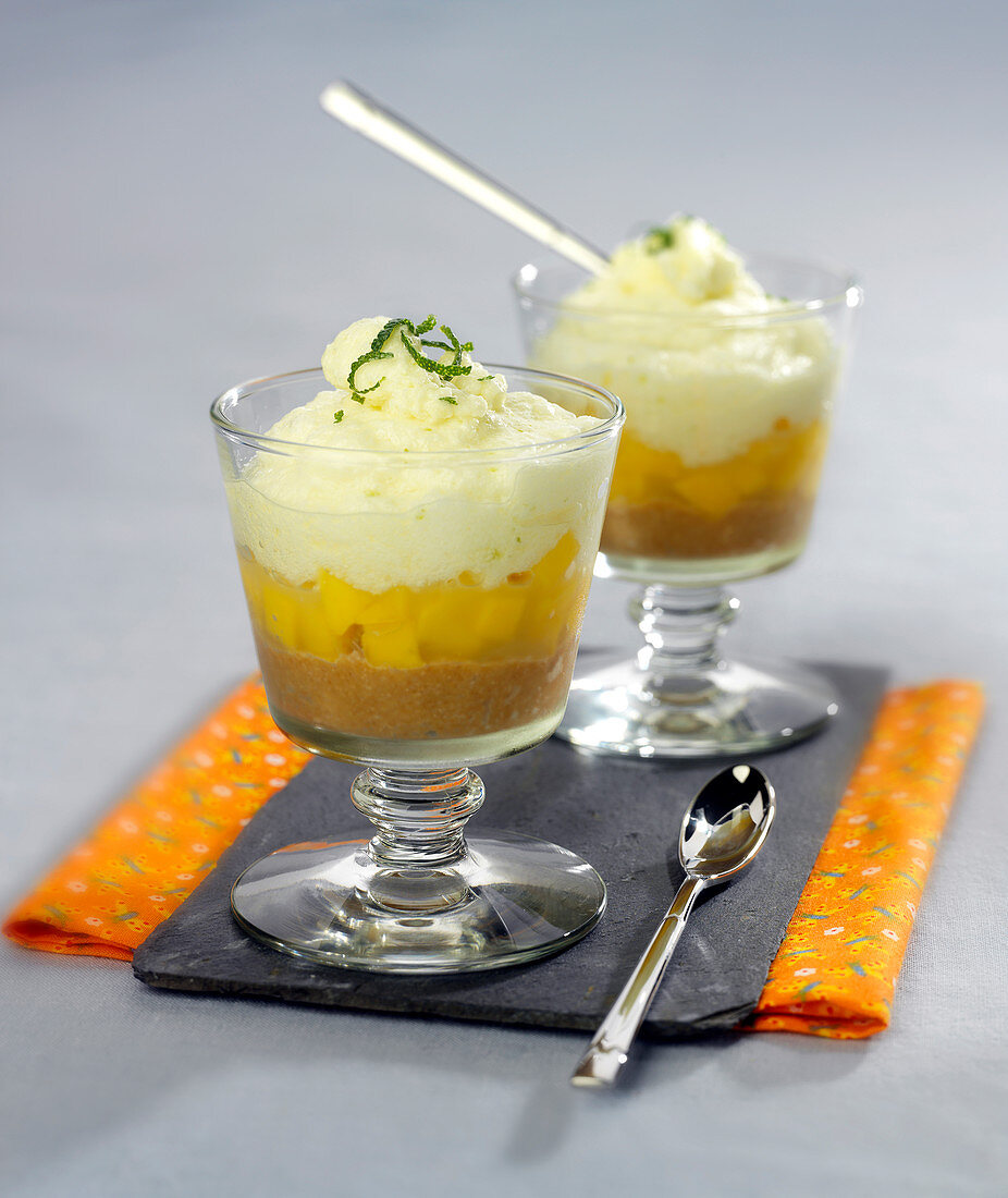 Shortbread crumbs, diced mango and lemon and lime mousse desserts