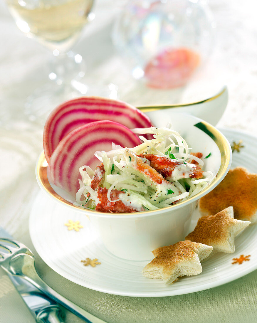 White cabbage,crab and thinly sliced chioggia beetroot salad