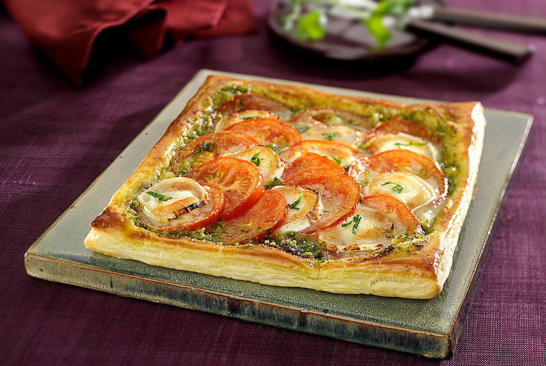 Pesto,cod, tomato and goat's cheese flaky pastry tart