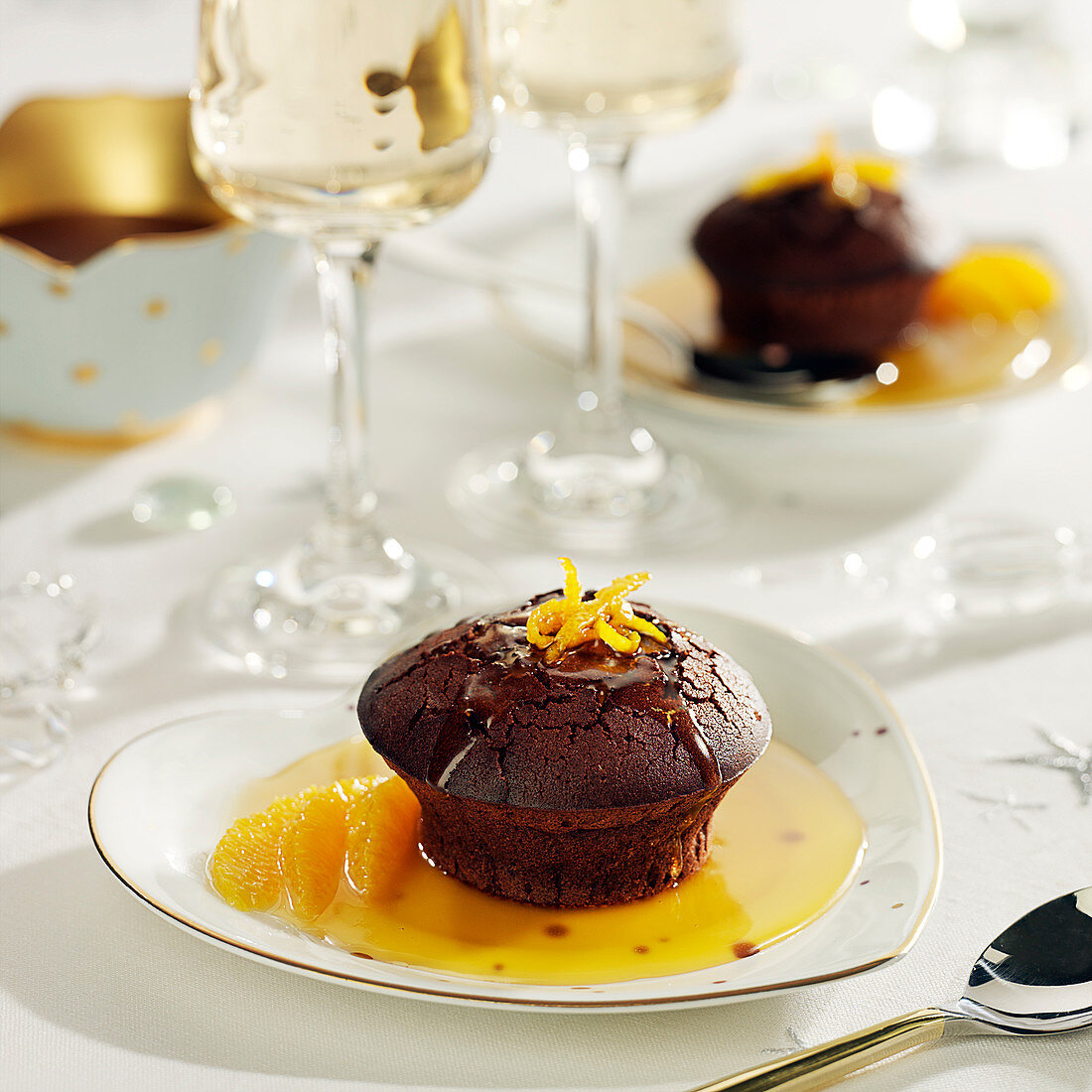 Small chocolate and orange cake, honey and salted-butter sauce